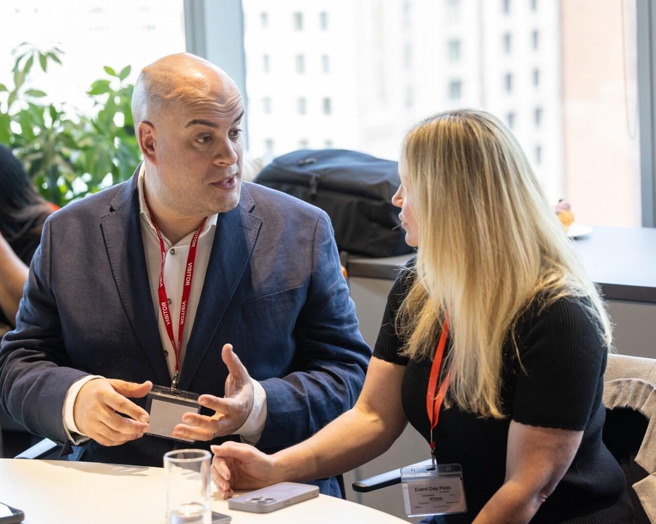 Two attendees talking and engaging at a Small Business Institute training event